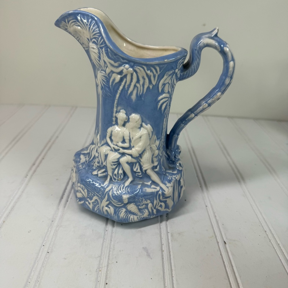 Vintage blue & white relief art ceramic pitcher